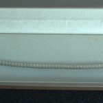 Pulsera tipo caja articulada en oro blanco 18K sin piedras