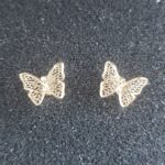 Set de aretes de oro amarillo en forma de mariposas